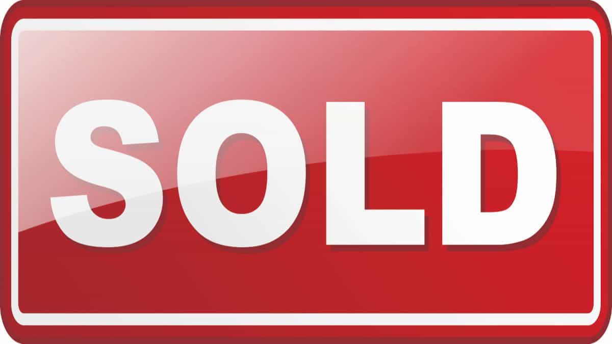 Image of a large sign saying "Sold"